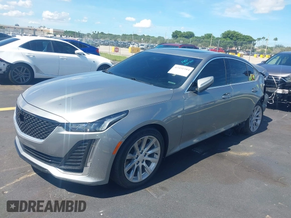 2023 Cadillac CT5 Luxury z VIN 1G6DW5RK3P0106764, wystawiony jako IAAI lot #42491584 z przebiegiem 32 223 mil mil oraz . Historia ofert i sprzedaży dostępna na DreamBid. Obrazek 17.