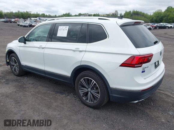 2018 Volkswagen Tiguan SEL with VIN 3VV2B7AX7JM099570, listed as a IAAI auction lot 42374274 with 87,838 mi miles and . Bid and sale history available at DreamBid. Image 3.