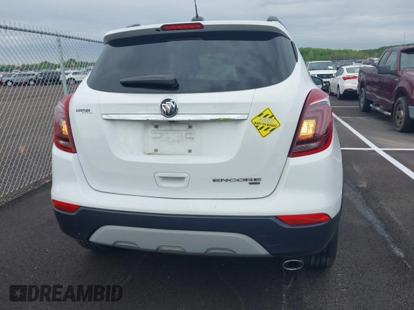 2019 Buick Encore Essence with VIN KL4CJGSM2KB876329, listed as a IAAI auction lot 42101397 with 84,020 mi miles. Bid and sale history available at carsss.com. Image 15.