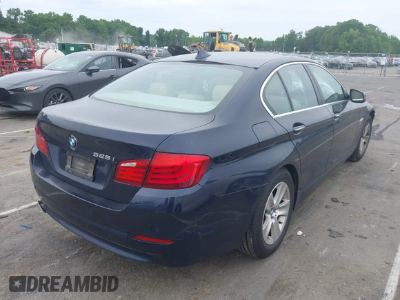 2012 BMW 5 Series 528i xDrive with VIN WBAXH5C58CDW08404, listed as a IAAI auction lot 42222460 with 146,851 mi miles and . Bid and sale history available at DreamBid. Image 4.