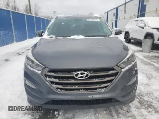 2016 Hyundai Tucson SE z VIN KM8J33A40GU184479, wystawiony jako Copart lot #83184724 z przebiegiem 150 732 mil mil oraz Czysty tytuł • Clean title. Historia ofert i sprzedaży dostępna na DreamBid. Obrazek 5.