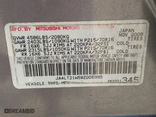 2009 Mitsubishi Outlander ES with VIN JA4LT21W59Z006995, listed as a IAAI auction lot 41639949 with 216,605 mi miles. Bid and sale history available at carsss.com. Image 9.