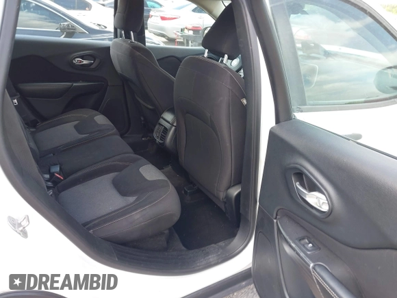 2015 Jeep Cherokee Sport with VIN 1C4PJLAB2FW566132, listed as a IAAI auction lot 42103012 with 138,016 mi miles. Bid and sale history available at carsss.com. Image 8.