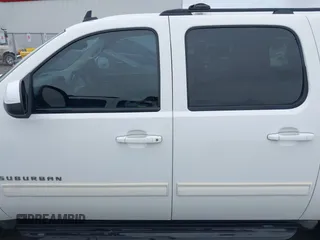 2012 Chevrolet Suburban LT with VIN 1GNSCJE00CR165813, listed as a IAAI auction lot 42494042 with 205,998 mi miles and . Bid and sale history available at DreamBid. Image 14.