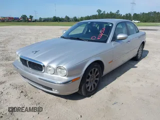 2004 Jaguar XJ 8 z VIN SAJWA71C24SG32778, wystawiony jako IAAI lot #42265164 z przebiegiem 155 872 mil mil oraz . Historia ofert i sprzedaży dostępna na DreamBid. Obrazek 2.