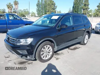 2018 Volkswagen Tiguan S with VIN 3VV1B7AX1JM091928, listed as a IAAI auction lot 42283454 with 53,650 mi miles and . Bid and sale history available at DreamBid. Image 17.