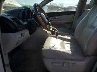 2007 Lexus RX 400h z VIN JTJGW31U172001380, wystawiony jako Copart lot #49689255 z przebiegiem 193 823 mil mil oraz Szkody całkowita. Historia ofert i sprzedaży dostępna na DreamBid. Obrazek 7.