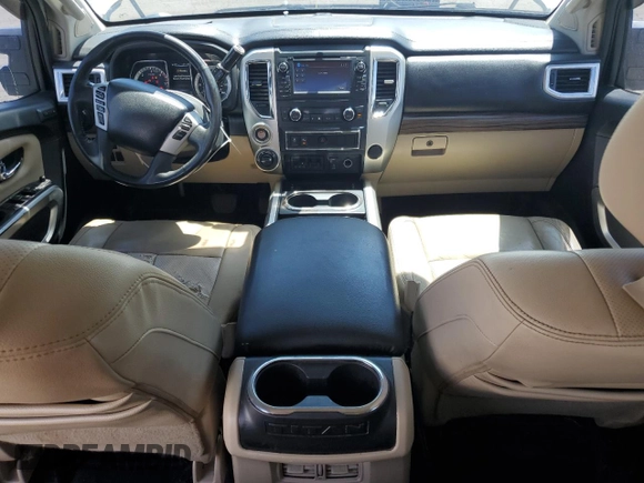 2016 Nissan Titan Platinum Reserve z VIN 1N6BA1F41GN504539, wystawiony jako Copart lot #64812975 z przebiegiem 143 144 mil mil oraz Szkoda całkowita • Salvage title. Historia ofert i sprzedaży dostępna na DreamBid. Obrazek 8.