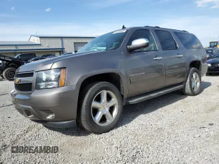 2012 Chevrolet Suburban LT with VIN 1GNSKJE77CR240491, listed as a Copart auction lot 52559985 with 189,549 mi miles and Salvage title. Bid and sale history available at DreamBid. Image 1.