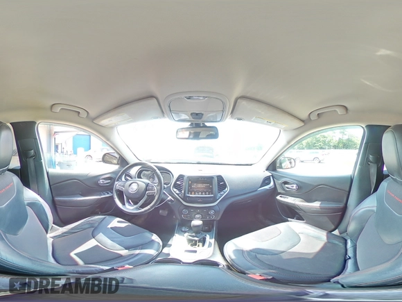 2014 Jeep Cherokee Trailhawk z VIN 1C4PJMBS4EW236608, wystawiony jako Copart lot #63672685 z przebiegiem 132 341 mil mil oraz Szkoda całkowita • Salvage title. Historia ofert i sprzedaży dostępna na DreamBid. Obrazek 16.