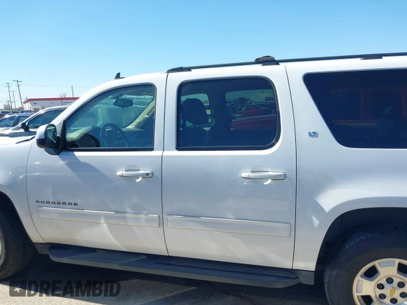 2011 Chevrolet Suburban LT with VIN 1GNSCJE07BR342646, listed as a IAAI auction lot 41698811 with 118,856 mi miles. Bid and sale history available at carsss.com. Image 14.
