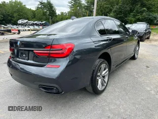 2019 BMW 7 Series 740i xDrive with VIN WBA7E4C55KGV28722, listed as a Copart auction lot 64955445 with 94,901 mi miles and Clean title. Bid and sale history available at DreamBid. Image 3.