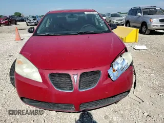 2006 Pontiac G6 6-Cyl z VIN 1G2ZG558364131914, wystawiony jako Copart lot #58775044 z przebiegiem 178 484 mil mil oraz Szkoda całkowita • Salvage title. Historia ofert i sprzedaży dostępna na DreamBid. Obrazek 11.