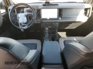 2024 Ford Bronco Wildtrak z VIN 1FMEE2BP1RLA54539, wystawiony jako Copart lot #46310905 z przebiegiem 12 545 mil mil oraz Szkody całkowita. Historia ofert i sprzedaży dostępna na DreamBid. Obrazek 8.