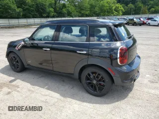 2012 MINI Countryman S with VIN WMWZC5C55CWL56879, listed as a Copart auction lot 63572725 with 86,979 mi miles and Clean title. Bid and sale history available at DreamBid. Image 2.