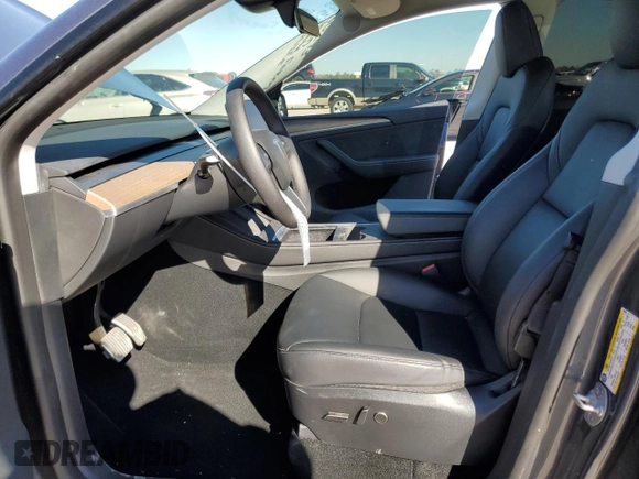 2023 Tesla Model Y Long Range with VIN 7SAYGDEE9PA180293, listed as a Copart auction lot 89062695 with 21,648 mi miles and Salvage Title. Bid and sale history available at DreamBid. Image 7.