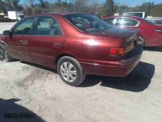 2001 Toyota Camry CE with VIN 4T1BG22K81U057843, listed as a IAAI auction lot 41679958 with 375,284 mi miles. Bid and sale history available at carsss.com. Image 3.