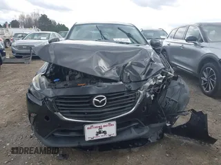 2017 Mazda CX-3 Touring with VIN JM1DKFC70H0163315, listed as a IAAI auction lot 41721515 with 144,662 mi miles. Bid and sale history available at carsss.com. Image 12.