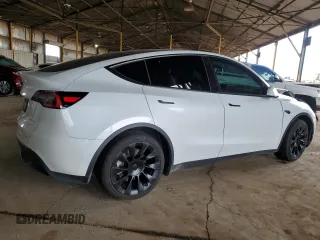 2021 Tesla Model Y Long Range with VIN 5YJYGDEE6MF075819, listed as a Copart auction lot 50903425 with 67,857 mi miles and Salvage Title. Bid and sale history available at DreamBid. Image 3.