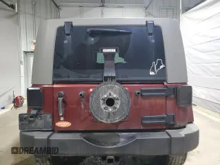 2007 Jeep Wrangler Unlimited Sahara с VIN 1J4GA591X7L198917, выставлен на аукционе Copart как лот 53311565 с пробегом 244 368 миль миль и Списание • Salvage title. История ставок и продаж доступна на DreamBid. Изображение 6.