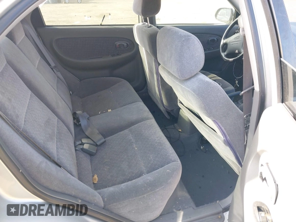 2003 Kia Spectra GS z VIN KNAFB161535095413, wystawiony jako IAAI lot #41478418 z przebiegiem 141 441 mil mil oraz . Historia ofert i sprzedaży dostępna na DreamBid. Obrazek 8.