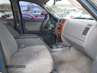 2005 Dodge Dakota SLT with VIN 1D7HE48N85S261745, listed as a IAAI auction lot 41401763 with 153,799 mi miles and . Bid and sale history available at DreamBid. Image 5.