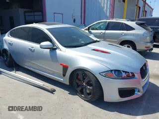 2014 Jaguar XF with VIN SAJWA8JH5EMU24558, listed as a IAAI auction lot 42396825 with 82,013 mi miles and . Bid and sale history available at DreamBid. Image 1.