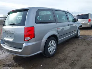 2014 Dodge Grand Caravan SE with VIN 2C4RDGBG6ER475051, listed as a IAAI auction lot 41857218 with 230,842 mi miles. Bid and sale history available at carsss.com. Image 4.