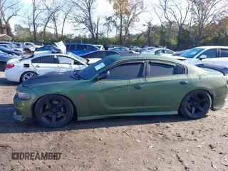 2019 Dodge Charger Scat Pack with VIN 2C3CDXGJ4KH572619, listed as a IAAI auction lot 40973015 with 40,148 mi miles and . Bid and sale history available at DreamBid. Image 14.