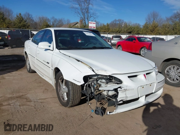 2001 Pontiac Grand Am GT with VIN 1G2NW52E11C244447, listed as a IAAI auction lot 41697883 with 81,983 mi miles. Bid and sale history available at carsss.com. Image 6.