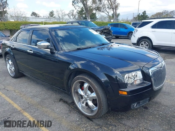 2007 Chrysler 300 with VIN 2C3KA43R57H852331, listed as a IAAI auction lot 41946742 with 211,168 mi miles. Bid and sale history available at carsss.com. Image 1.