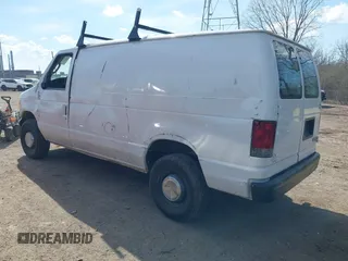 2004 Ford Econoline Cargo Commercial with VIN 1FTNE24W34HA52697, listed as a IAAI auction lot 41919725 with 107,931 mi miles and . Bid and sale history available at carsss.com. Image 3.