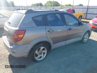 2003 Pontiac Vibe z VIN 5Y2SL62813Z404110, wystawiony jako IAAI lot #42300385 z przebiegiem 247 657 mil mil oraz . Historia ofert i sprzedaży dostępna na DreamBid. Obrazek 4.
