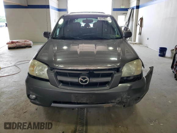 2005 Mazda Tribute S with VIN 4F2CZ96115KM59847, listed as a Copart auction lot 67740144 with 217,053 mi miles and Salvage Title. Bid and sale history available at carsss.com. Image 5.