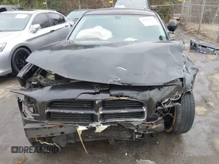 2010 Dodge Charger Police with VIN 2B3AA4CT2AH120654, listed as a IAAI auction lot 41639772 with 183,037 mi miles and . Bid and sale history available at carsss.com. Image 6.