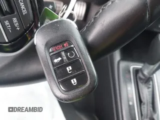 2023 Honda Civic Sport with VIN 2HGFE2F54PH512202, listed as a IAAI auction lot 42331949 with 44,568 mi miles and . Bid and sale history available at DreamBid. Image 11.