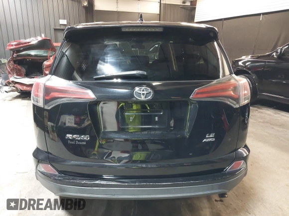 2018 Toyota RAV4 LE with VIN 2T3BFREV7JW768376, listed as a IAAI auction lot 41864571 with 292,147 mi miles. Bid and sale history available at carsss.com. Image 17.