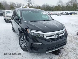 2019 Honda Pilot EX-L with VIN 5FNYF6H52KB051363, listed as a IAAI auction lot 41591540 with 109,860 mi miles. Bid and sale history available at carsss.com. Image 1.