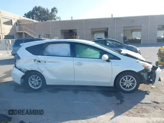 2017 Toyota Prius v Two with VIN JTDZN3EU9HJ066736, listed as a IAAI auction lot 42025100 with 89,082 mi miles. Bid and sale history available at carsss.com. Image 14.