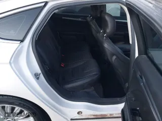 2014 Ford Fusion Energi Titanium with VIN 3FA6P0SU8ER269351, listed as a IAAI auction lot 41145570 with 122,128 mi miles. Bid and sale history available at carsss.com. Image 8.