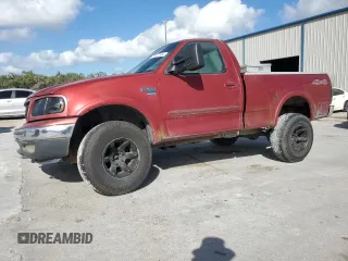 2000 Ford F-150 XL with VIN 1FTRF18W4YNB41818, listed as a Copart auction lot 78877544 with Not provided miles and Salvage title. Bid and sale history available at DreamBid. Image 1.