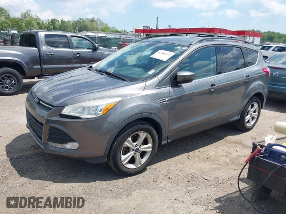 2014 Ford Escape SE with VIN 1FMCU0G98EUB23109, listed as a IAAI auction lot 42186287 with 134,793 mi miles. Bid and sale history available at carsss.com. Image 2.