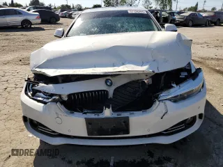 2015 BMW 4 Series 428i with VIN WBA4A9C58FGL85220, listed as a Copart auction lot 57128265 with 115,257 mi miles and Salvage title. Bid and sale history available at DreamBid. Image 5.
