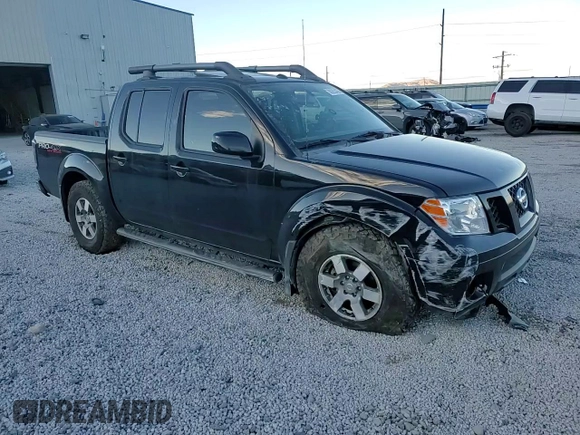 2011 Nissan Frontier Pro-4X with VIN 1N6AD0EV8BC427339, listed as a Copart auction lot 88293455 with 99,856 mi miles and Salvage title. Bid and sale history available at DreamBid. Image 12.