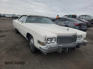 1974 Cadillac Eldorado z VIN 6L67S4Q408046, wystawiony jako Copart lot #77112024 z przebiegiem 97 414 mil mil oraz Szkoda całkowita • Salvage title. Historia ofert i sprzedaży dostępna na DreamBid. Obrazek 4.