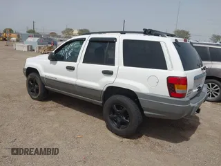2002 Jeep Grand Cherokee with VIN 1J8GW38S62C219396, listed as a IAAI auction lot 41831930 with 196,167 mi miles and . Bid and sale history available at DreamBid. Image 3.