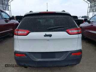 2016 Jeep Cherokee Latitude with VIN 1C4PJLCB5GW207159, listed as a IAAI auction lot 41232649 with 103,991 mi miles. Bid and sale history available at carsss.com. Image 16.