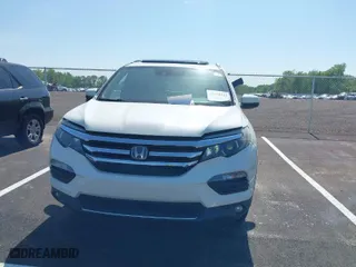 2017 Honda Pilot Touring with VIN 5FNYF5H96HB036547, listed as a IAAI auction lot 42058142 with 161,828 mi miles. Bid and sale history available at carsss.com. Image 12.