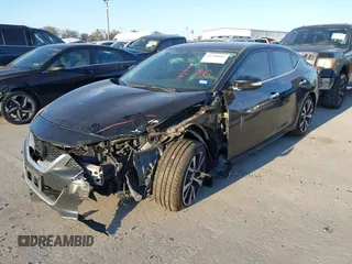 2016 Nissan Maxima Platinum z VIN 1N4AA6AP6GC430470, wystawiony jako IAAI lot #41390041 z przebiegiem 86 483 mil mil oraz . Historia ofert i sprzedaży dostępna na DreamBid. Obrazek 18.