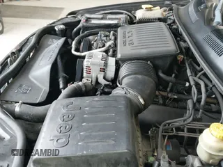 2004 Jeep Grand Cherokee Laredo z VIN 1J4GW48N14C379335, wystawiony jako IAAI lot #43407129 z przebiegiem 190 194 mil mil oraz . Historia ofert i sprzedaży dostępna na DreamBid. Obrazek 19.